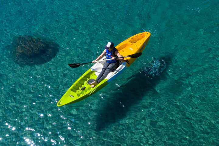 a person riding a surf board in the water