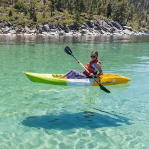 a person riding a surf board on a body of water