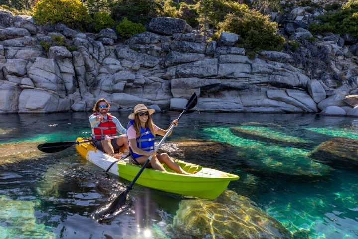 a person in a raft on the water