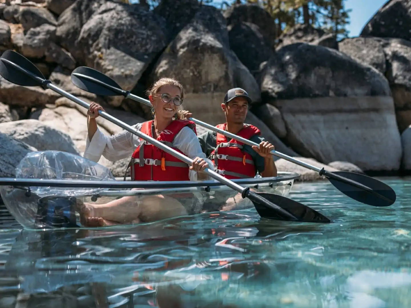 a man riding on the back of a boat