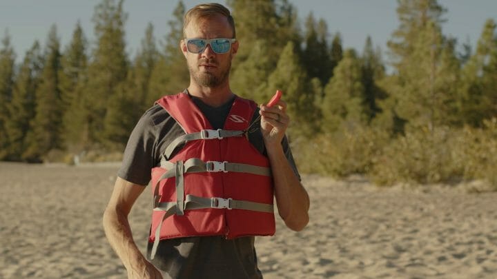 a person holding a frisbee