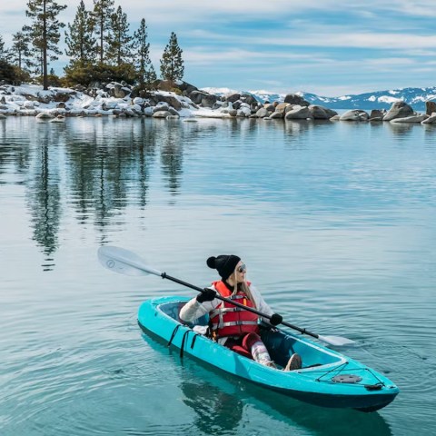 a small boat in a body of water
